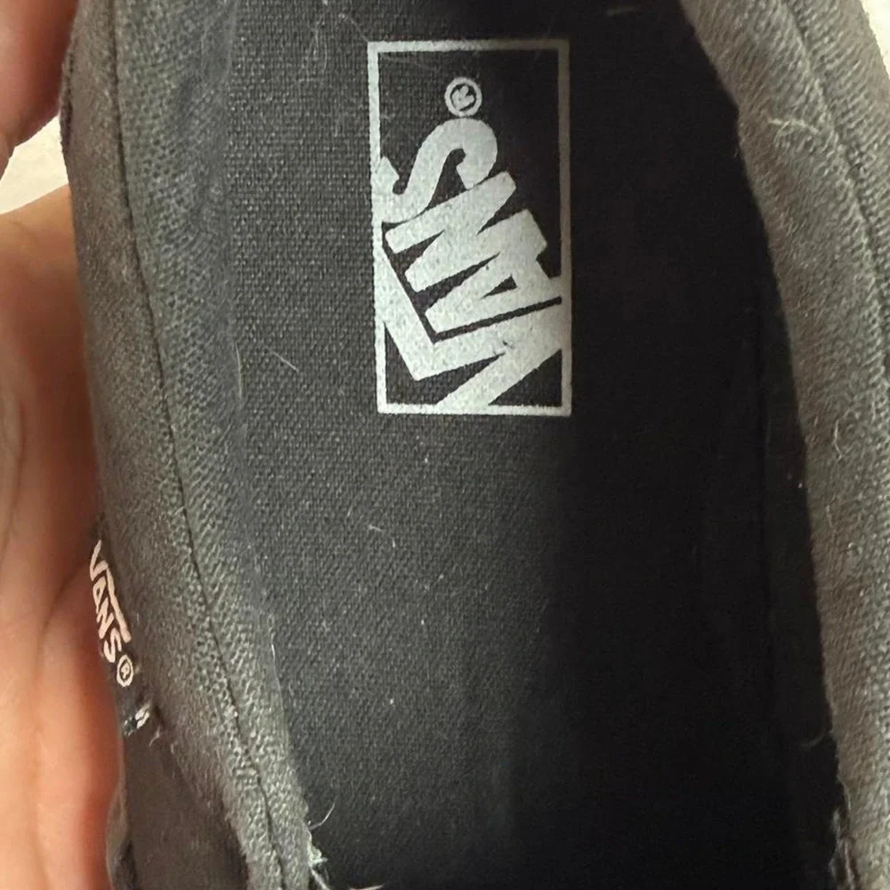 Black Vans slip on trainers